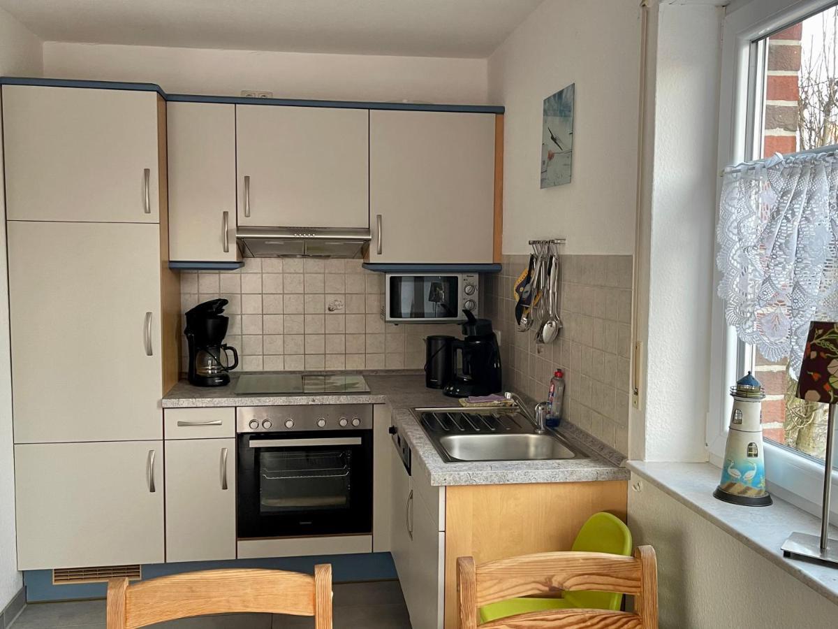 Ferienhaus Seehund Krummhörn Esterno foto