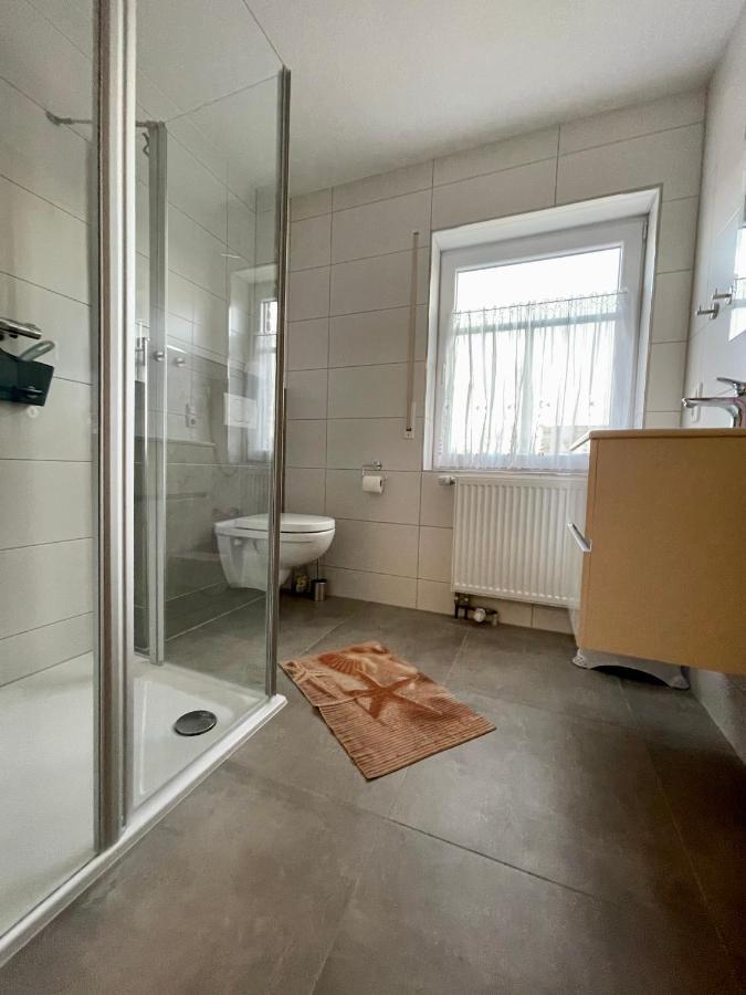 Ferienhaus Seehund Krummhörn Esterno foto