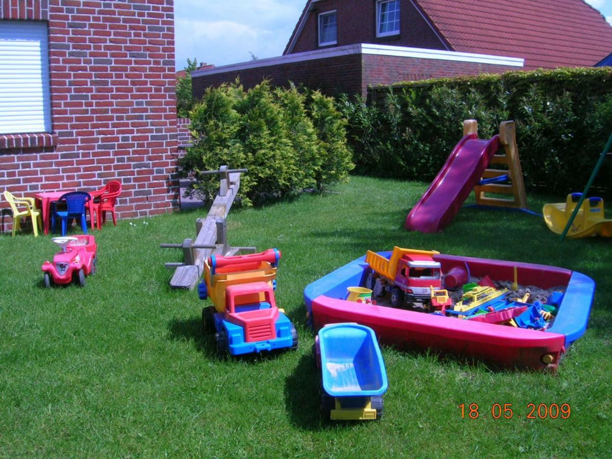Ferienhaus Seehund Krummhörn Esterno foto
