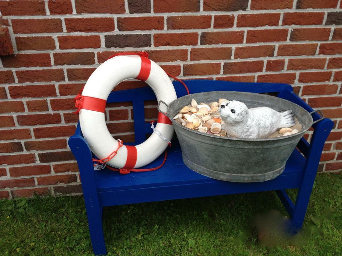 Ferienhaus Seehund Krummhörn Esterno foto